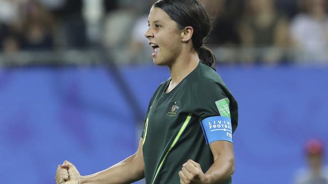 Australia's Sam Kerr celebrates after scoring her side's fourth goal