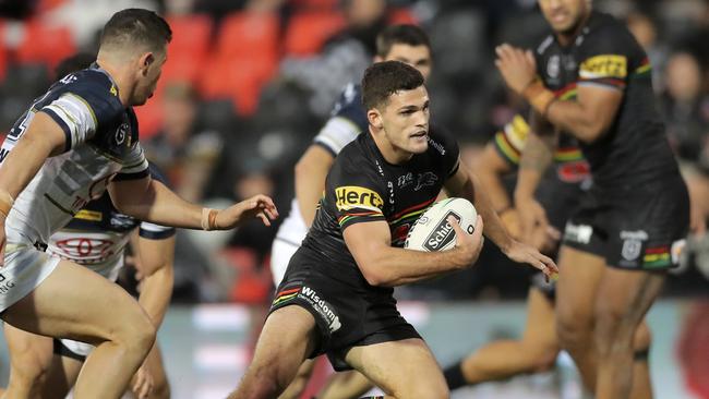 Nathan Cleary of the Panthers breaks through the defence during the round 10 NRL match between the Penrith Panthers and the North Queensland Cowboys at Panthers Stadium.