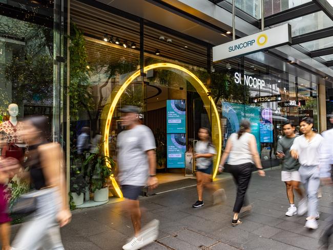 Business Finance Generics. Retail, Shoppers at Suncorp Bank Pitt St Mall Store. Picture - ChrisPavlich/The Australian