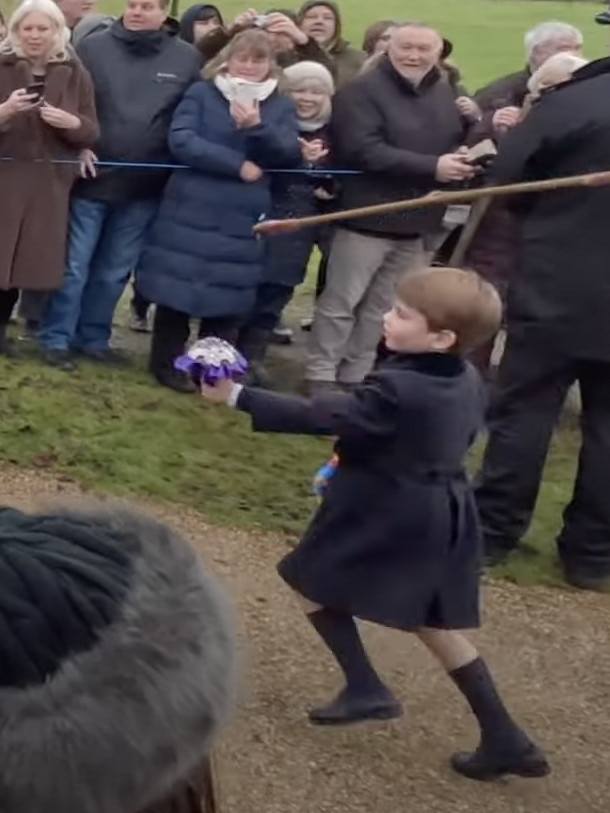 Prince Louis could be seen chasing after his sister Princess Charlotte before handing her flowers.