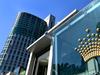 Crown swings to loss, suspends dividends