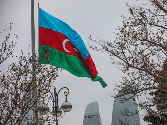 Azerbaijan's national flag is flying at half-mast around the country in memory of the victims. Picture: Getty Images