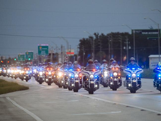 A convoy of police motorbikes drives ahead of Joe Biden's motorcade. Picture: Angus Mordant for NewsCorp Australia