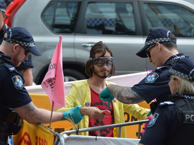 Serial climate pest Eric Herbert has been banned from entering the Brisbane CBD or using any bridges connecting to the inner-city after being arrested for illegal protesting for the seventh time. Photo Extinction Rebellion