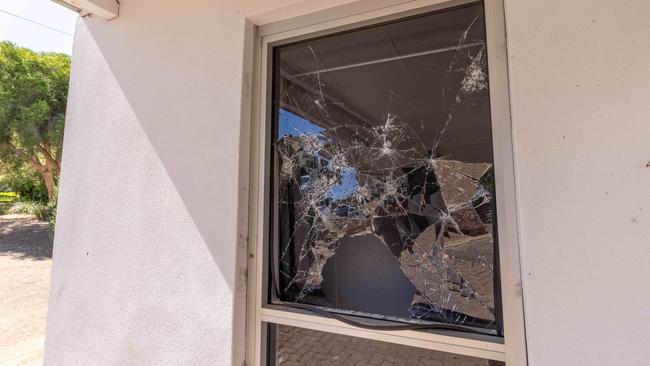 Damage to Happy Valley Primary School windows, which were smashed with hundreds of golf balls. Picture: Ben Clark