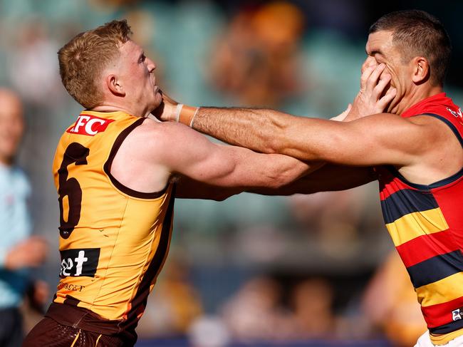 LAUNCESTON, AUSTRALIA - APRIL 23: James Sicily of the Hawks and Taylor Walker of the Crows clash during the 2023 AFL Round 06 match between the Hawthorn Hawks and the Adelaide Crows at UTAS Stadium on April 23, 2023 in Launceston, Australia. (Photo by Michael Willson/AFL Photos via Getty Images)