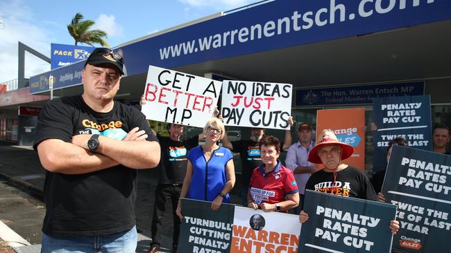 Electrical Trades Union State Organiser Rob Hill and other members of the public rallied outside Member for Leichardt Warren Entch's office on Mulgrave Road to protest the cutting of penalty rates for casual workers in 2018. Picture: Brendan Radke