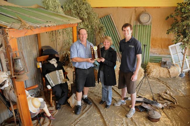 Todd White, Tracey McKean and Brenton Smith, winner of the Muster window. Picture: Craig Warhurst