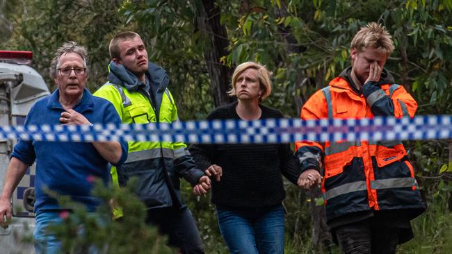 Members of the Wall family arrive at the tragic scene after his body was found, less than 2km from home. Picture: Jason Edwards