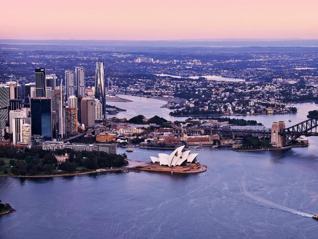 DAILY TELEGRAPH -  7.5.25Sydney at sunrise pictured from a helicopter. Opera House and Harbour Bridge pictured in the cityscape. CLOUDS REMOVED IN PHOTOSHOP.   Picture: Sam Ruttyn
