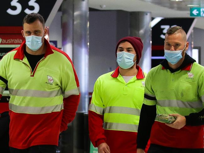 Aviation workers at Sydney Domestic Airport Terminal. Picture: NCA NewsWire / Gaye Gerard