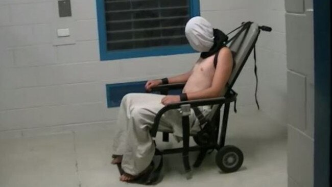 A child is hooded and strapped to mechanical restraint chair in the Northern Territory Don Dale Detention Centre.