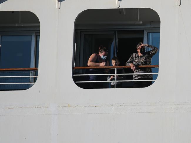 SYDNEY, AUSTRALIA - NCA NEWSWIRE PHOTOS July 18, 2022: Passengers with Covid are seen still in their cabins as the P&O Pacific Explorer Cruise ship arrived into Sydney with over 100 crew and passengers reported with Covid-19. Picture: NCA Newswire / Gaye Gerard