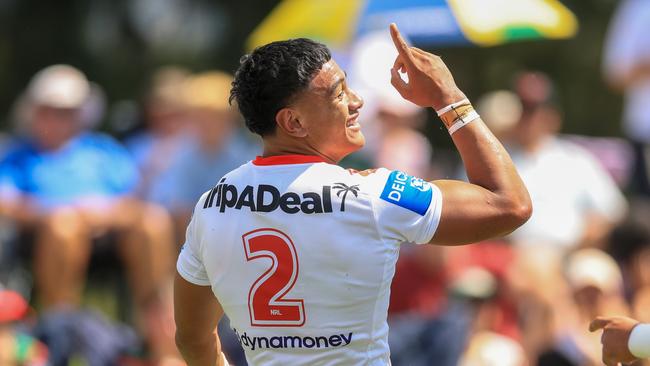 Sione Finau celebrates after one of his four tries. (Photo by Mark Evans/Getty Images)