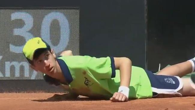 The boy appeared dazed after collapsing on court.