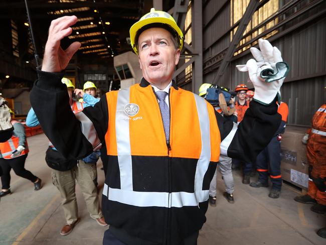 Opposition Leader Bill Shorten dons hi-vis to mix with the common worker.