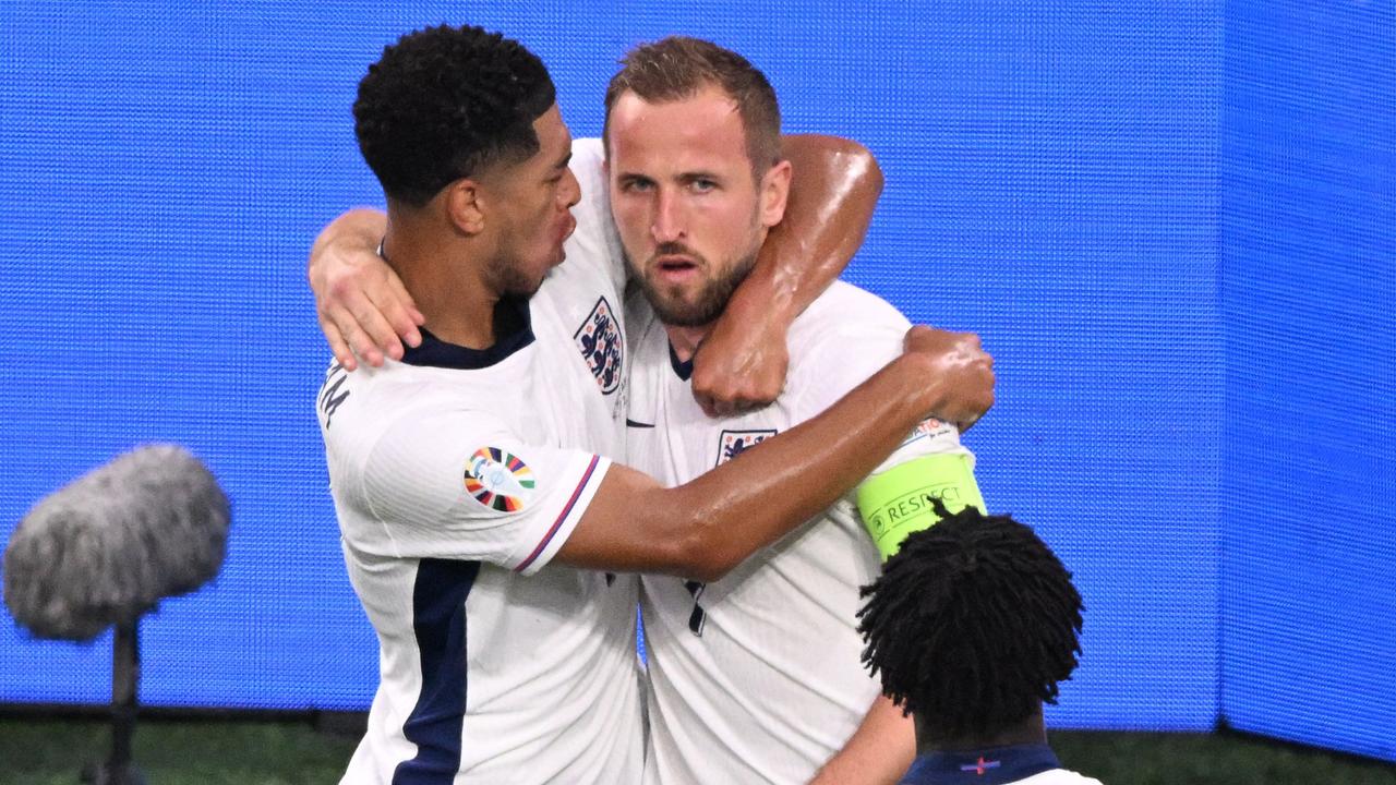 England's forward #09 Harry Kane celebrates with England's midfielder #10 Jude Bellingham. (Photo by Kirill KUDRYAVTSEV / AFP)