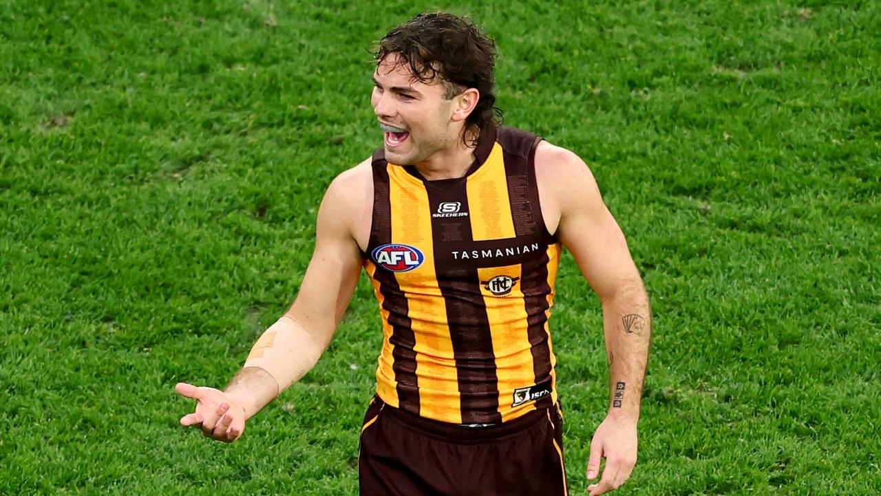 Hawks forward latest AFL star caught giving middle-finger salute