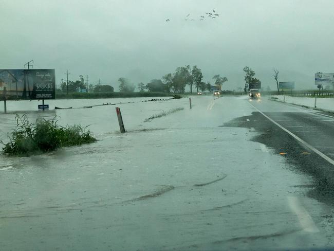 David Barwell captured this photo of flood waters rising at Lethebrook, about 5km south of Proserpine on the Bruce Highway, about 7.30am Saturday.