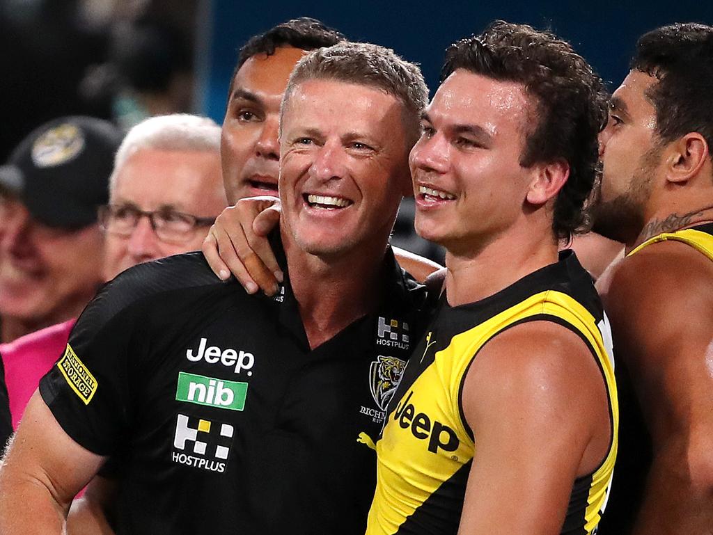 Damien Hardwickand Daniel Rioli celebrating the Tigers flag in 2020. Picture: Sarah Reed