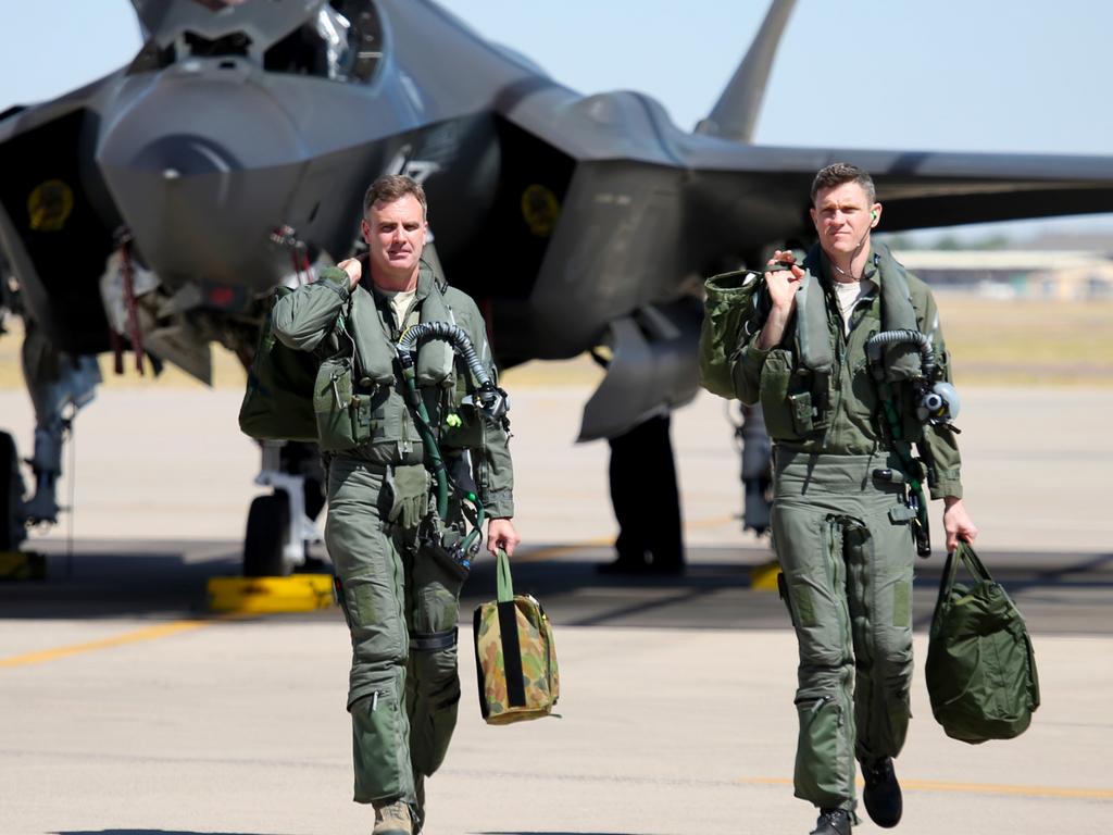 Australian Pilots training in the F35 fighter Jets Luke Airforce Base in Phoenix Arizona. Squadron leader Wing Commander Darren Clare (L) and Squadron Leader “Jacko” on the flight line before a flight. Picture: Nathan Edwards