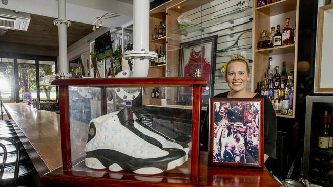 Joanne Hartmann with her signed shoes from professional basketball player Michael Jordan. Picture: Jerad Williams