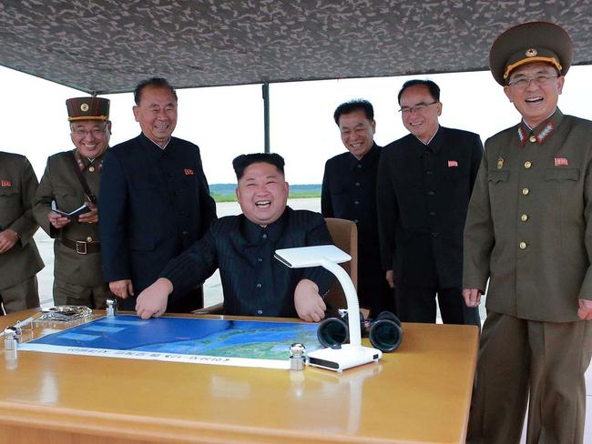 Kim Jong-un smiles during the test launch and called for more ballistic missile tests targeting the Pacific Ocean. Picture: Korean Central News Agency/Korea News Service/AP