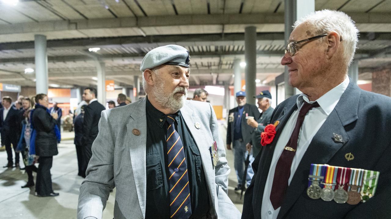 Alf Vanderhorst (left) and Alan Stiller catch up before marching to the Anzac Day dawn service, Monday, April 25, 2022. Picture: Kevin Farmer