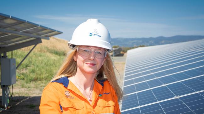 SA Water senior manager zero cost energy future Nicola Murphy with one of the utility's existing solar arrays. Picture: SA Water