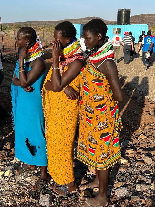 The Australian government is funding a program encouraging women like these three apiarists to take up bee-keeping as an alternate source of food and income as Turkana County in Kenya suffers through a devastating drought. Picture: Ellen Whinnett