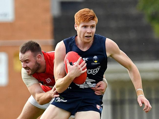 18/05/19 - SANFL: North Adelaide v South Adelaide at Prospect Oval.  Norths' Max Thring tackles Souths' Joseph Haines. Picture: Tom Huntley