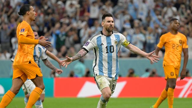 Lionel Messi celebrates after scoring Argentina’s second. (Photo by JUAN MABROMATA / AFP)