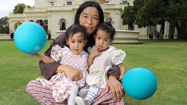 Mum Bhumchu Zangmo with Dawa and Nima on the lawn at Government House. Picture: Alex Coppel 