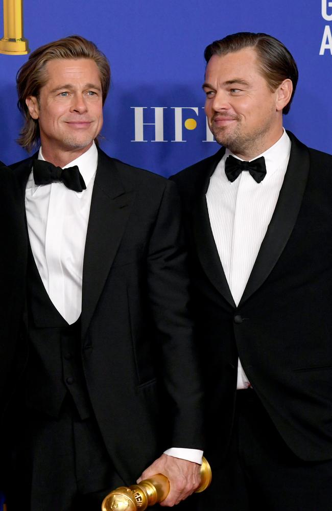 Brad Pitt, with his Golden Globe, and best mate, Leo. Picture: Getty Images