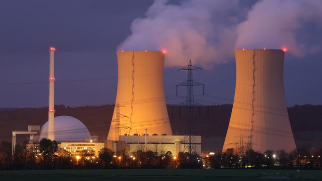 GROHNDE, GERMANY - NOVEMBER 08: Steam rises from cooling towers of the Grohnde Nuclear Power Plant on November 08, 2021 near Grohnde, Germany. The 1360 megawatt plant, which is operated by PreussenElektra, is scheduled to shut down at the end of this year. In all four nuclear power plants across Germany are scheduled to cease operation by the end of 2021 as part of Germany's ongoing exit from nuclear power. (Photo by Sean Gallup/Getty Images)