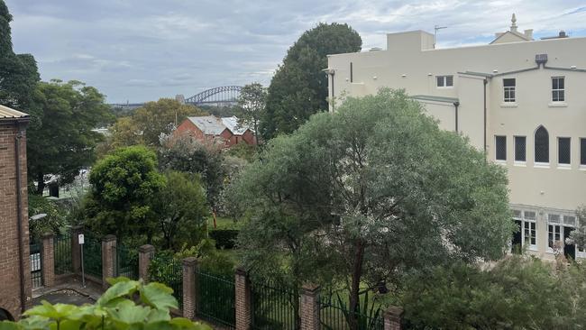 The view from 8 Rockwell Ln next to St Vincent’s College. The new building will reduce harbour views by 50 per cent.