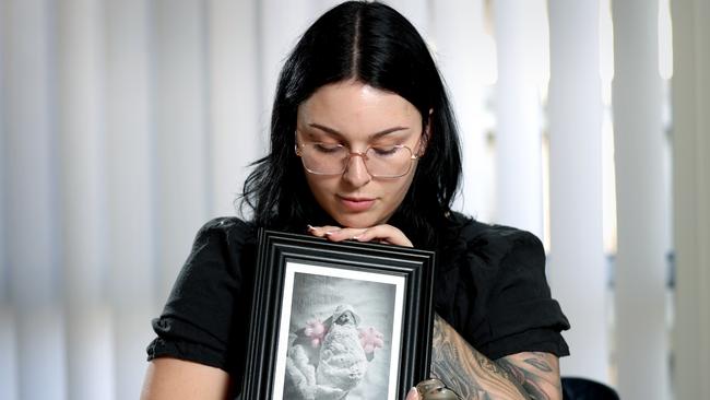 Haylee Loccisano holds a photo of her unborn baby Celeste, who was killed in a head-on car crash at Ipswich six months ago. Picture: Steve Pohlner