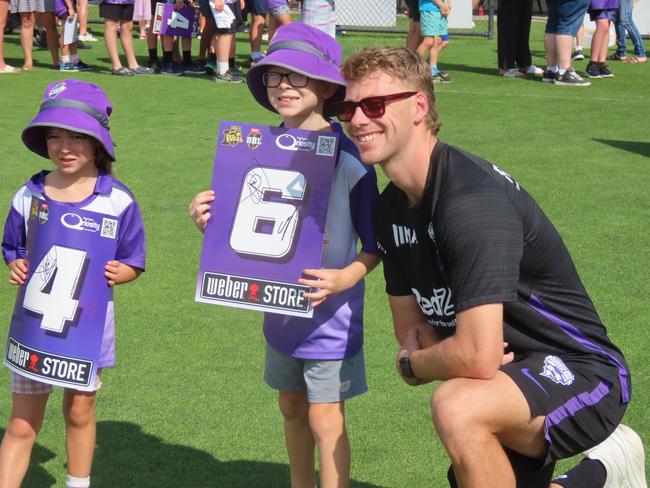 Hurricanes fans pose for a picture with player Riley Meredith at Tuesday's fan day in Launceston. Picture: Jon Tuxworth