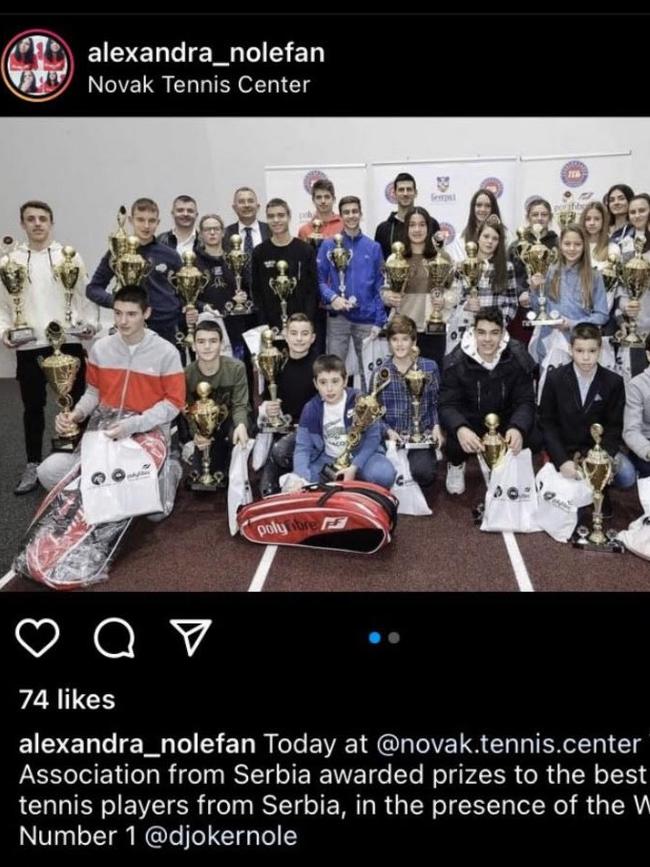 Djokovic with a group of children at an event on December 17.