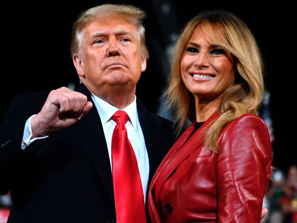 US President Donald Trump stands with First Lady Melania Trump at the end of a rally in Georgia. Picture: AFP