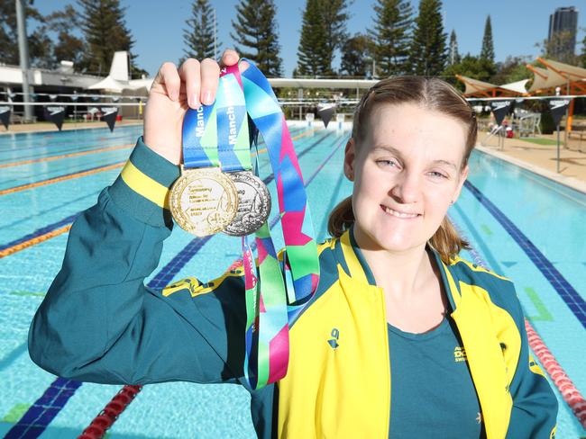 Gold Coast Women of the Year nominee, Paralymic swimmer Madeleine McTernan,with her medals at the Gold Coast Aquatic Centre . Picture Glenn Hampson