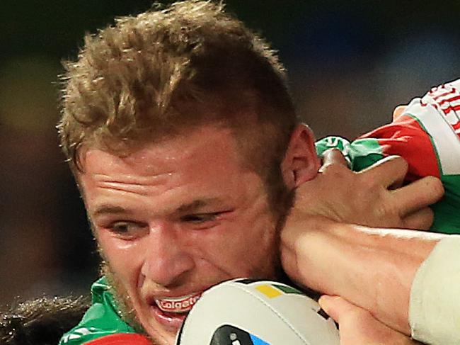 Tom Burgess of Souths is tackled during the Parramatta Eels v South Sydney Rabbitohs NRL round 4 game at Pirtek Stadium, Parramatta. pic Mark Evans