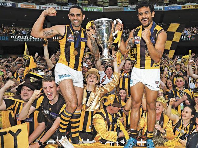 Shaun Burgoyne and Cyril Rioli celebrate the 2015 AFL Grand Final win. Photo: Quinn Rooney/Getty Images