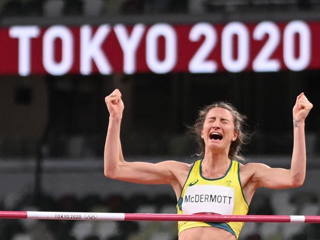 Australia's Nicola McDermott reacts while competing in the women's high jump final during the Tokyo 2020 Olympic Games at the Olympic Stadium in Tokyo on August 7, 2021. (Photo by Jonathan NACKSTRAND / AFP)