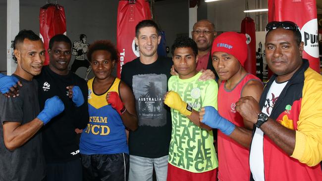 Second to None event organiser Peter Morrison with PNG boxers Charles Keama, Thadis Katua, Laizani Soma, Beupu Noki and John Ume training at PUNCH Blackbelt Pro Gym, Randwick. Picture: Craig Wilson