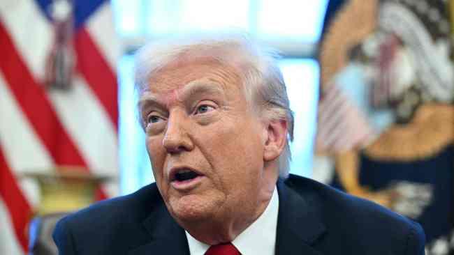 US President Donald Trump announces tariffs on auto imports in the Oval Office of the White House in Washington, DC, on March 26, 2025. Trump announced imposition of 25 percent tariffs on all cars and light trucks not built on US soil. 
