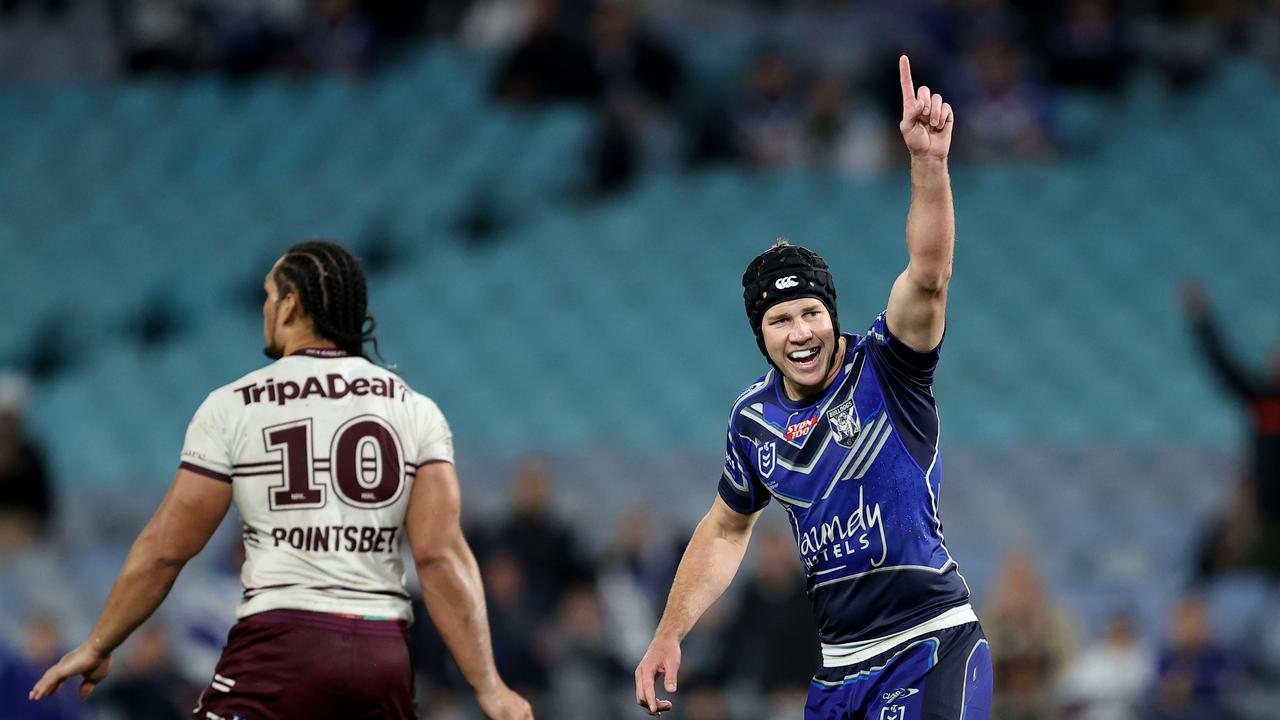 SYDNEY, AUSTRALIA - SEPTEMBER 02: Matt Burton of the Bulldogs kicks a field goal in the final minutes of the game during the round 25 NRL match between the Canterbury Bulldogs and the Manly Sea Eagles at Accor Stadium, on September 02, 2022, in Sydney, Australia. (Photo by Brendon Thorne/Getty Images)