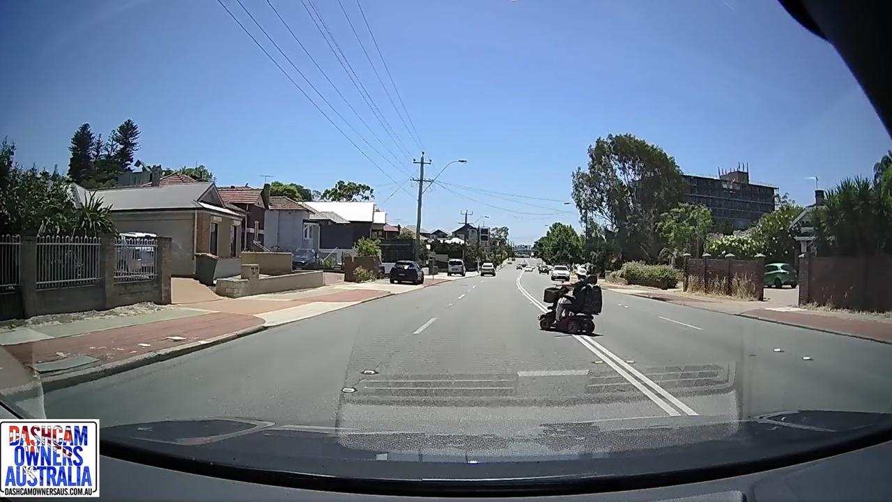 An older woman on a mobility scooter collided with a car on a busy Perth motorway. Picture: Facebook/ Dashcam Owners Australia