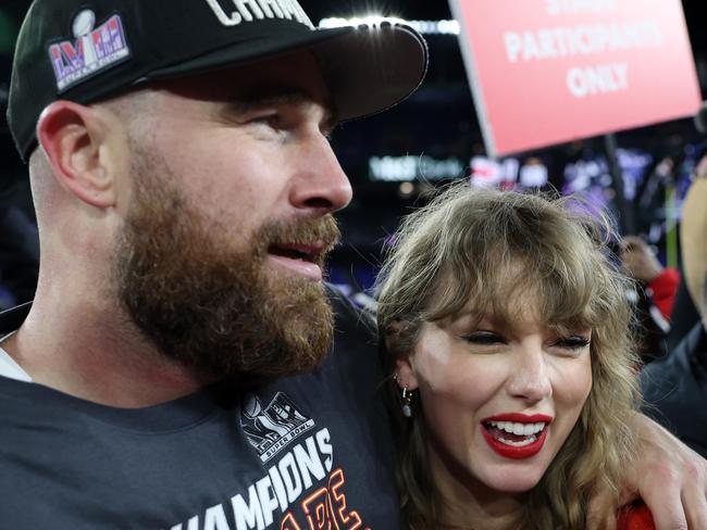 BALTIMORE, MARYLAND - JANUARY 28: Travis Kelce #87 of the Kansas City Chiefs celebrates with Taylor Swift after a 17-10 victory against the Baltimore Ravens in the AFC Championship Game at M&T Bank Stadium on January 28, 2024 in Baltimore, Maryland. (Photo by Patrick Smith/Getty Images)