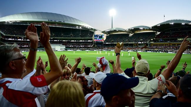 Spectators lap up the atmosphere during day three of the second Test match in the Ashes series between Australia and England at the Adelaide Oval on December 18, 2021. Picture: Quinn Rooney/Getty Images